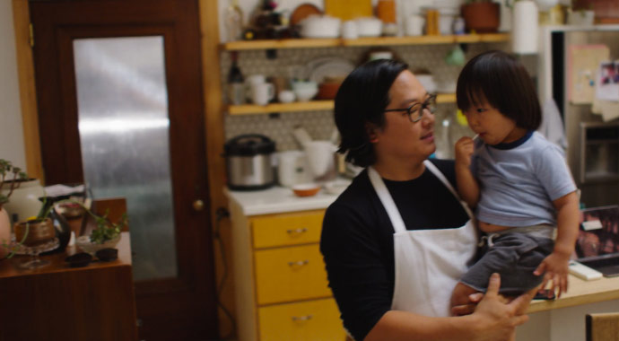 Chef Mota plates a dish in his restaurant kitchen