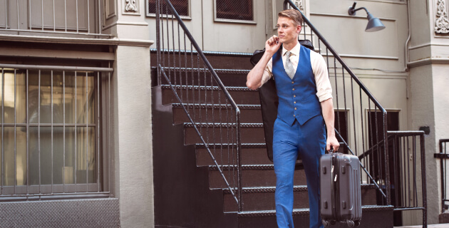 businessman on the phone going on a trip.