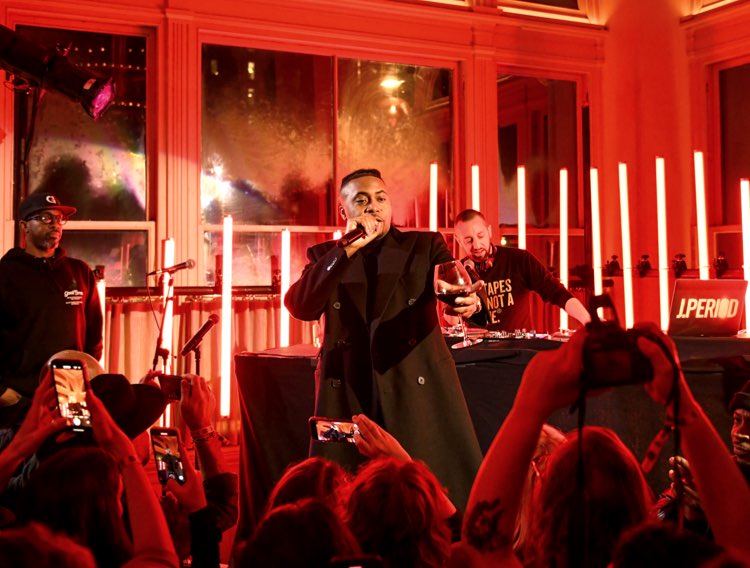Rapper Nas performing at Hip-Hop: Conscious, Unconscious