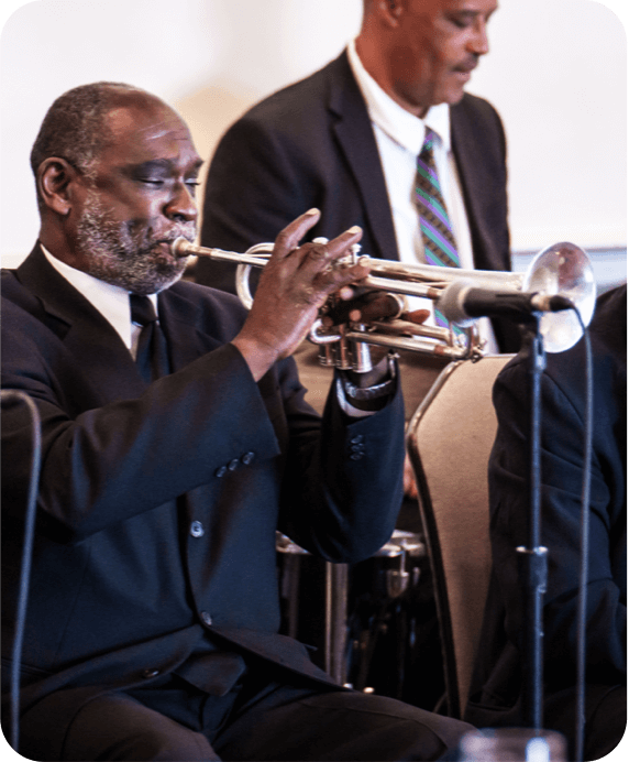 A trumpet player performs at the Explore New Orleans Culinary and Jazz Experience