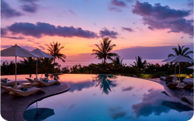 A breathtaking sunset overlooking the pool and ocean at the Sheraton Bali Kuta Resort