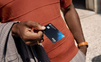  Closeup of man in red shirt with Reserve card in hand