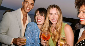 Candid shot of a group of friends at a cocktail party