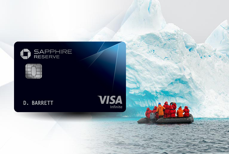Chase Sapphire Reserve(Registered Trademark) credit card to the left of a group of people on a boat tour in the ocean near a glacier