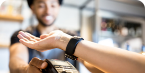 Man using smartwatch to pay