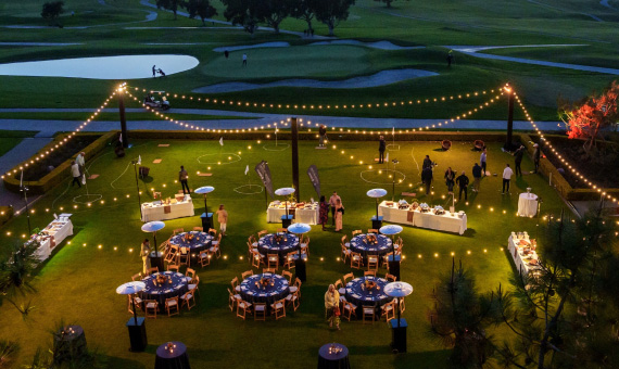 An overhead view of the opening reception for Cardmembers on the green at Torrey Pines