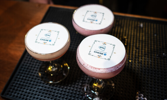 Mixed drinks adorned with the Avios x Chase logo