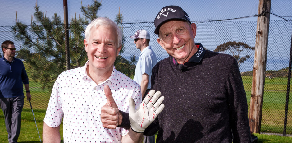 Renowned golf instructor David Leadbetter poses with a guest