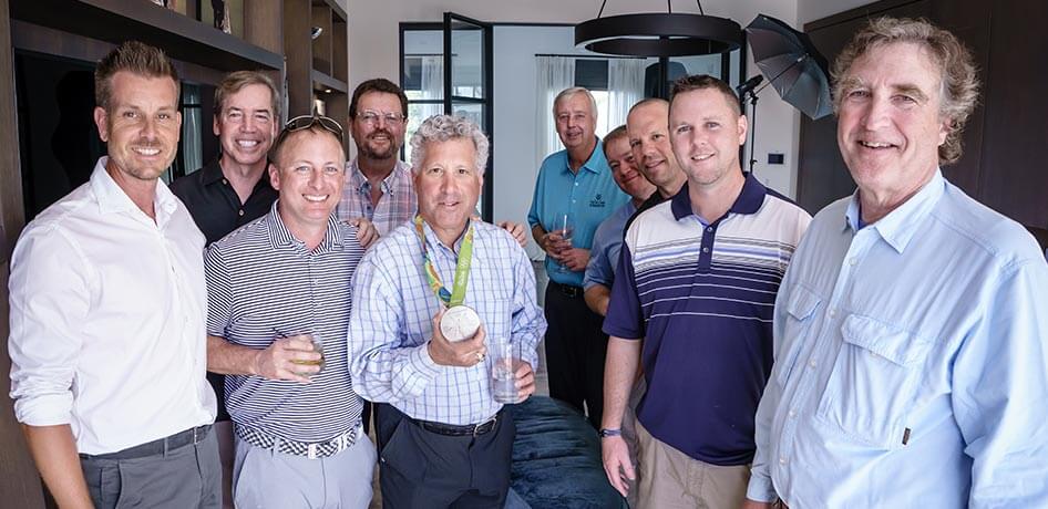 Henrik Stenson with several event attendees in his home