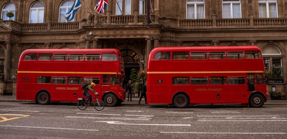 Two double decker buses on the streets of Edinburgh