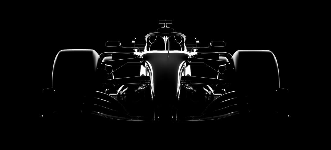 Studio shot of a racecar, silhouette on black that illuminates only the details