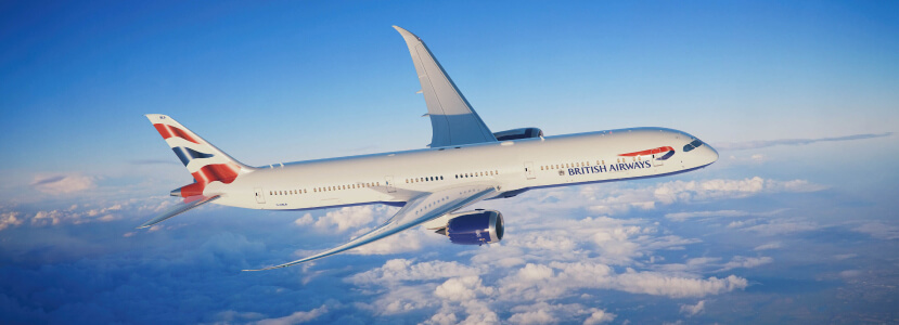 British Airways airplane in flight above the clouds