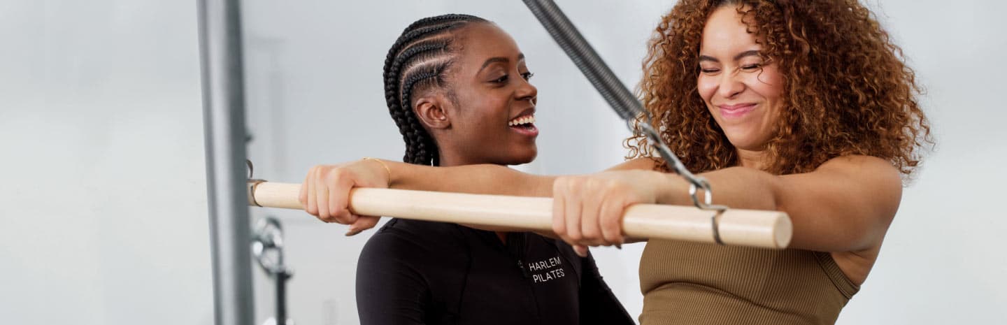 A woman looking at a friend with a smile