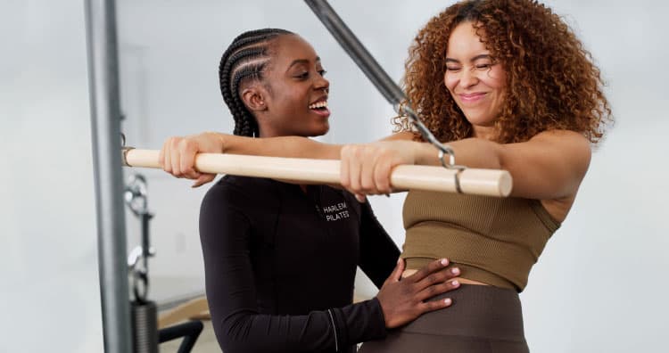 A woman looking at a friend with a smile