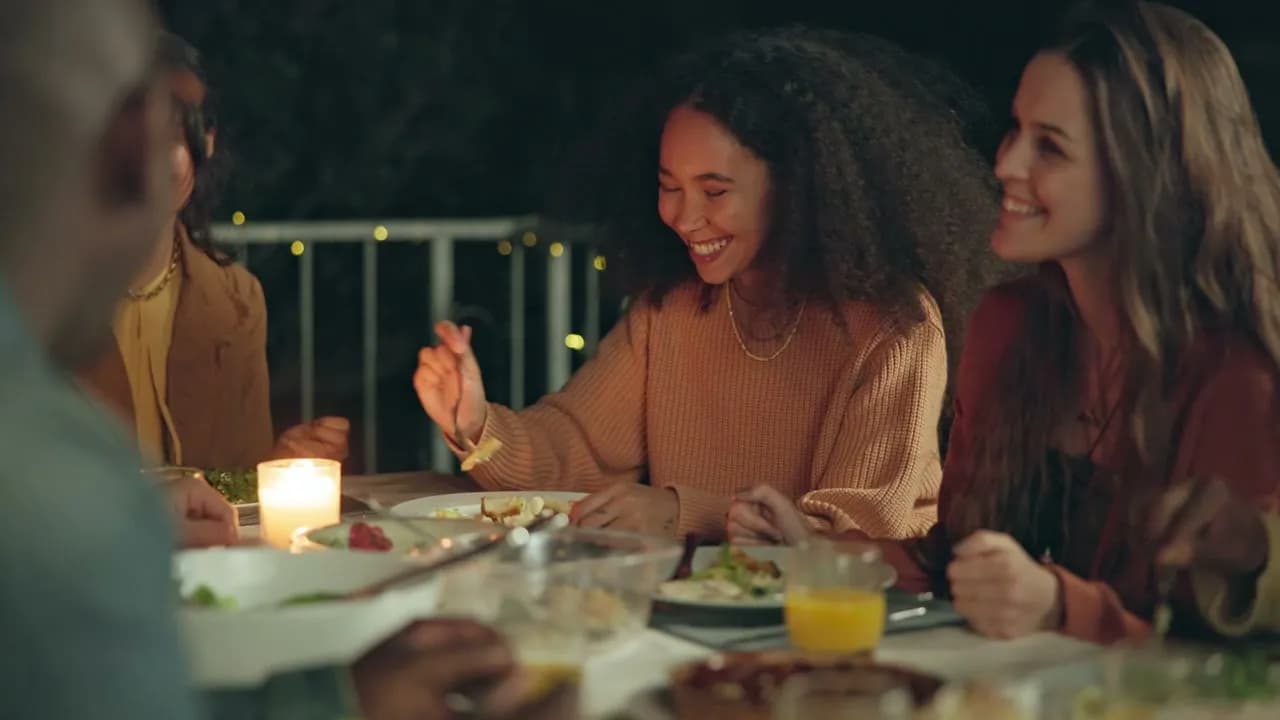 having candle light dinner