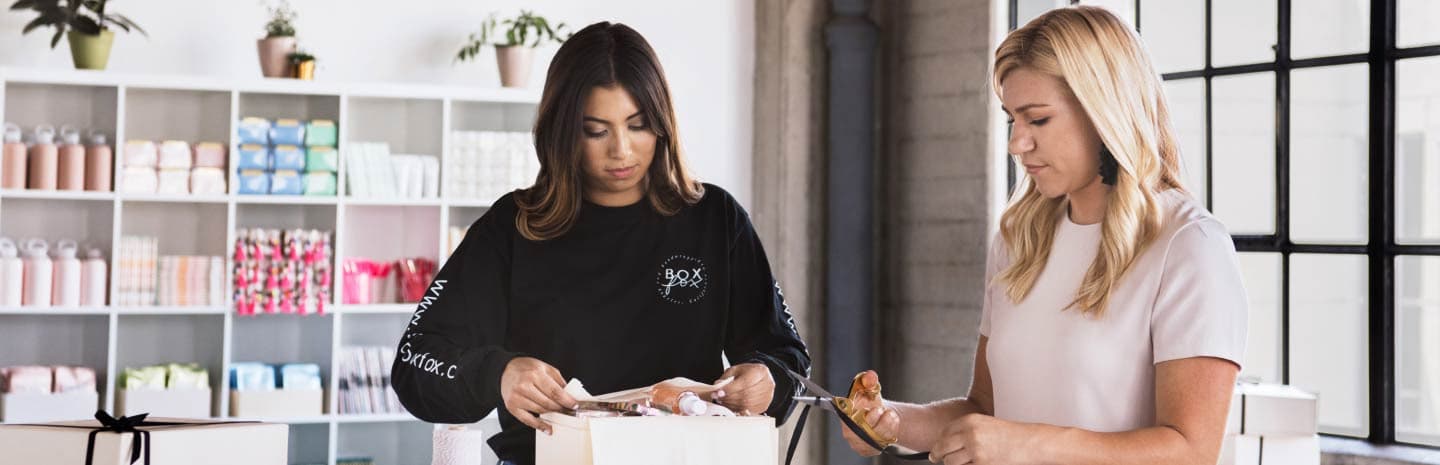 2 women looking down