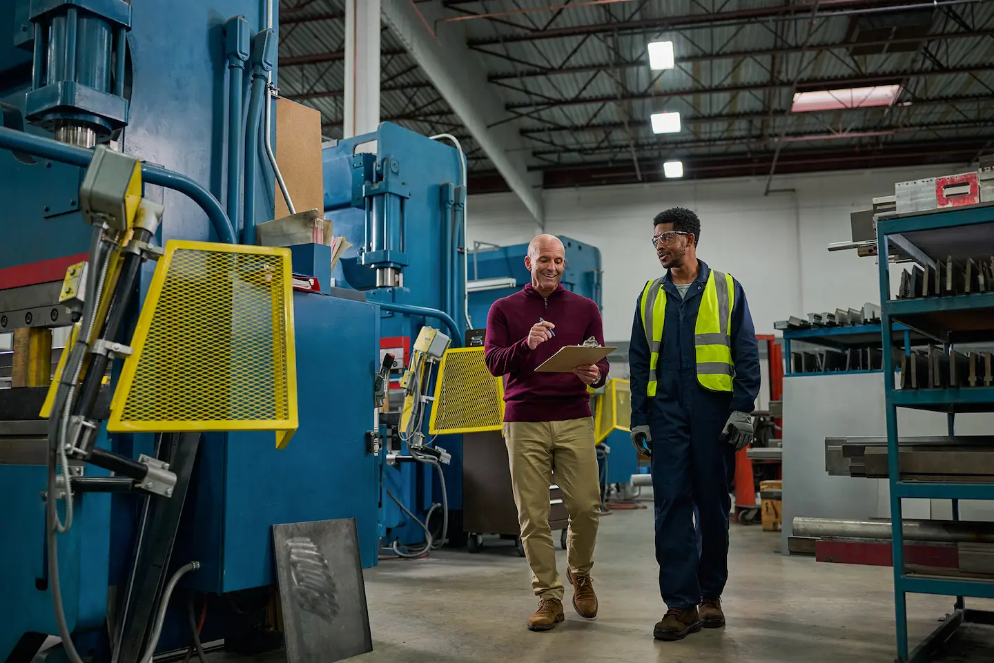 Coworkers checking off a list