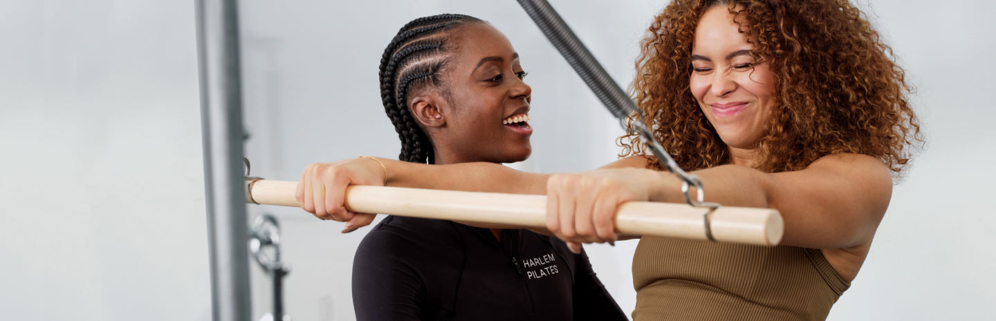 A woman looking at a friend with a smile