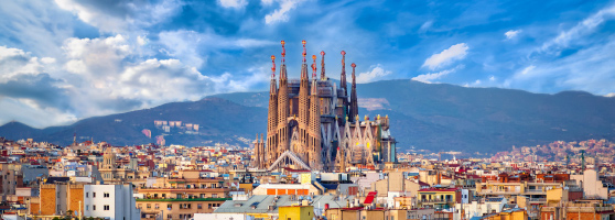 A view of Barcelona with a mountain in the background