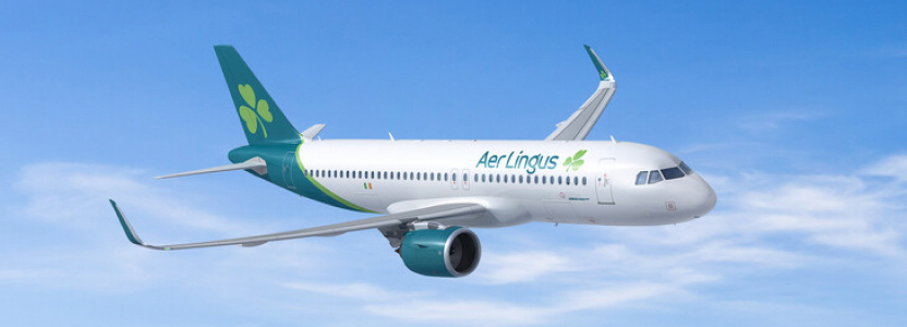 Aer Lingus airplane in flight above the clouds