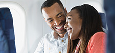 Couple sitting on plane