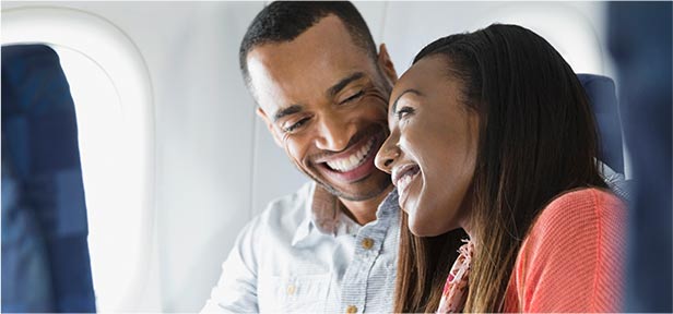 Couple sitting on plane