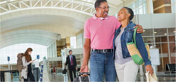 Couple walking in airport