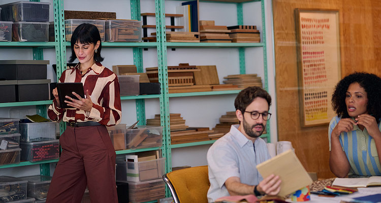 A woman looking at a friend with a smile