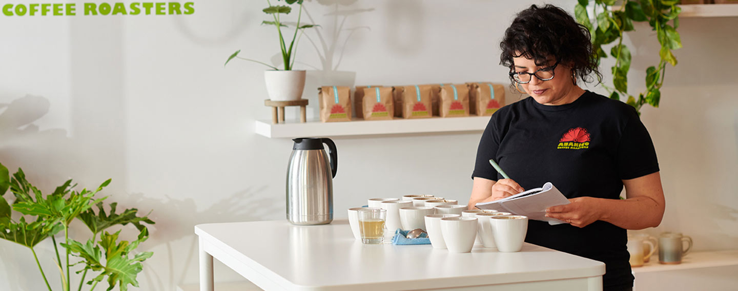 A woman writing in a notebook