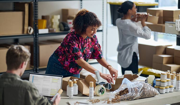 A woman smiling at her students