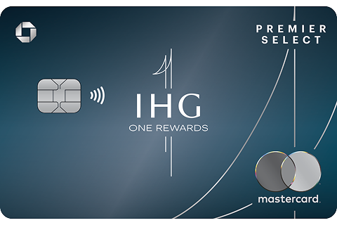 An ariel view of a Six Senses resort with the IHG One Rewards Premier Select credit card in the foreground