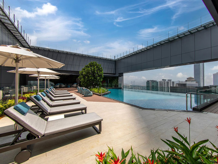Outdoor pool deck at Crowne Plaza Kuala Lumpur City Centre