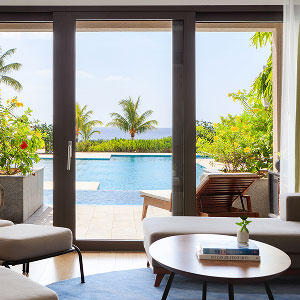 Resort room terrace with pool and ocean views, InterContinental Dominica