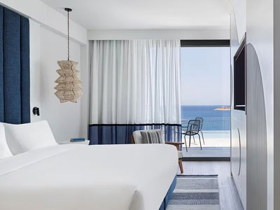 Guest room interior with balcony at InterContinental Crete