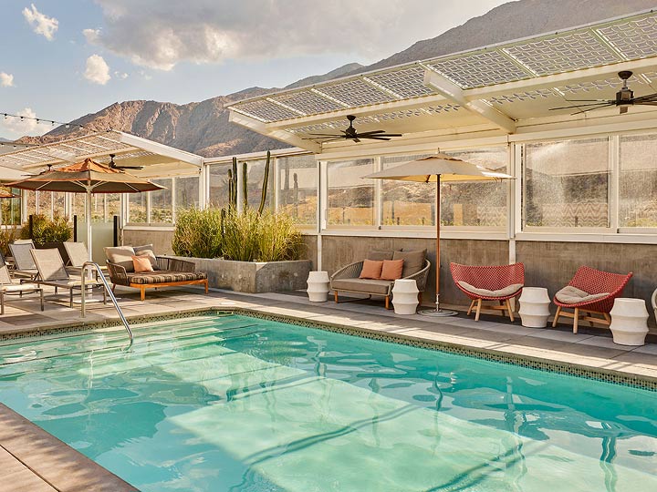 Rooftop pool at Kimpton Rowan Palm Springs with mountain views