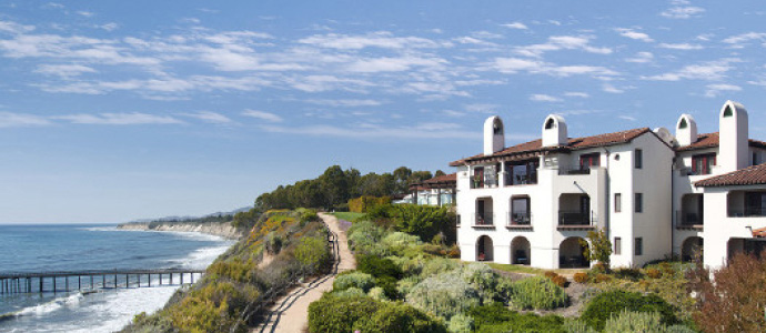 Oceanfront coastal estate along a cliffside path