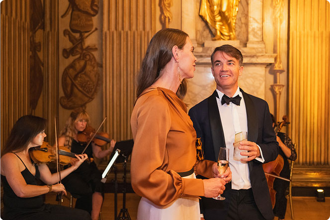 Guests mingling during palace reception