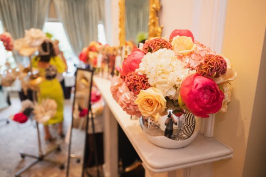 Floral arrangement on mantelpiece
