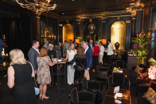Guests conversing at cocktail reception