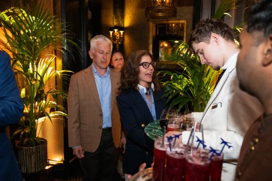 Guests mingling at evening event