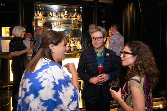 Guests chatting at cocktail hour