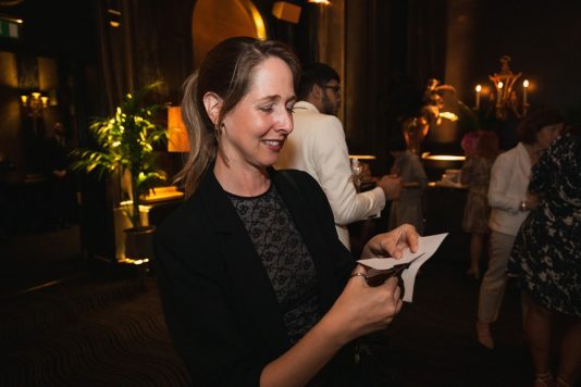 Guest reviewing event activity card