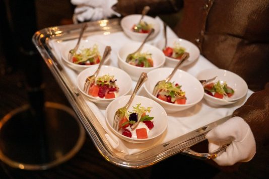 Passed appetizer cups on serving tray