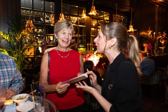 Conversation during evening reception