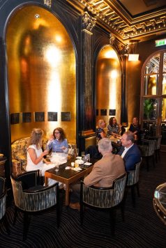 Guests seated in lounge area