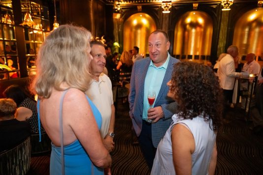 Guests mingling at cocktail reception