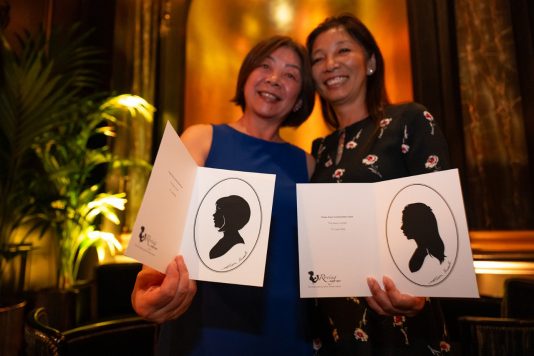 Guests displaying silhouette portraits