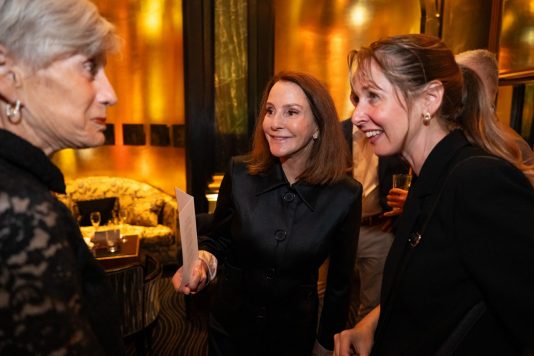 Guests chatting at evening reception