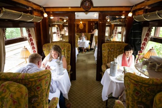Passengers dining aboard luxury train