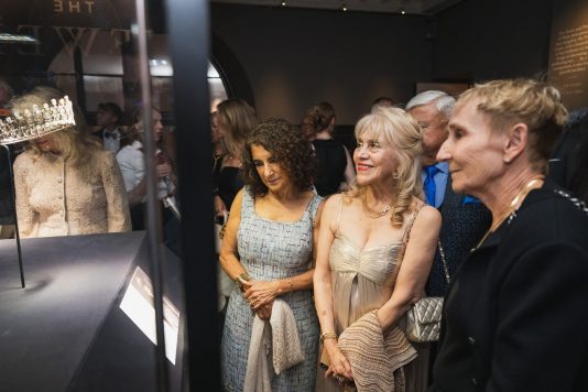 Guests viewing royal tiara exhibit